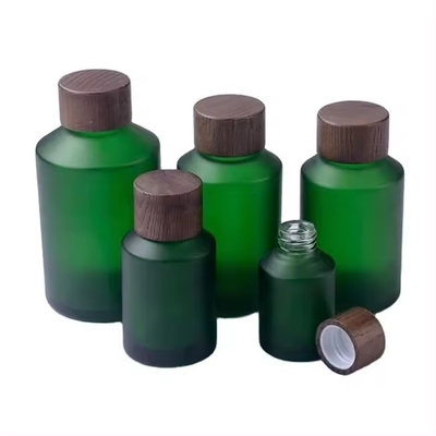 30g,50g,15ml,30ml,60ml,120ml,緑色の冷凍ガラスボトル 木製の螺旋蓋付き