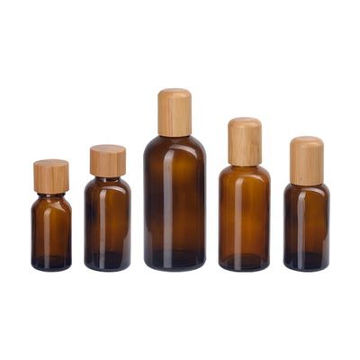 こはく色の装飾的な18 410精油の点滴器は10ml 18mmをびん詰めにする